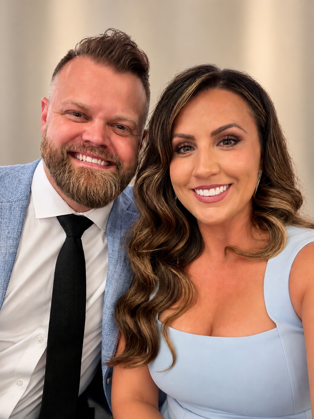 Renee and Ryan, founders of The Suited Stay